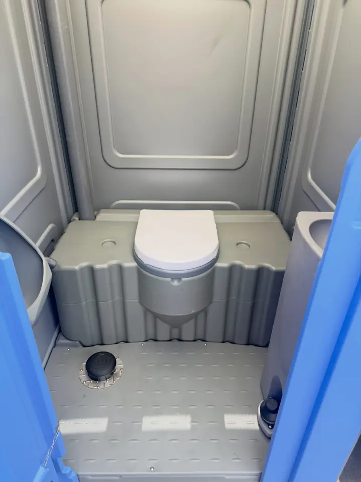 Freshly cleaned standard porta potty interior